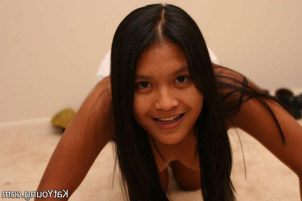 16P Kat Young Picture Gallery:: Lovely asian teen does her morning exercises topless