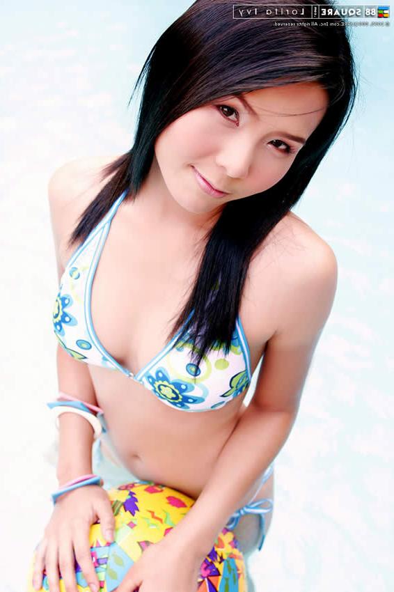 15P Adorable japanese teen posing by the pool