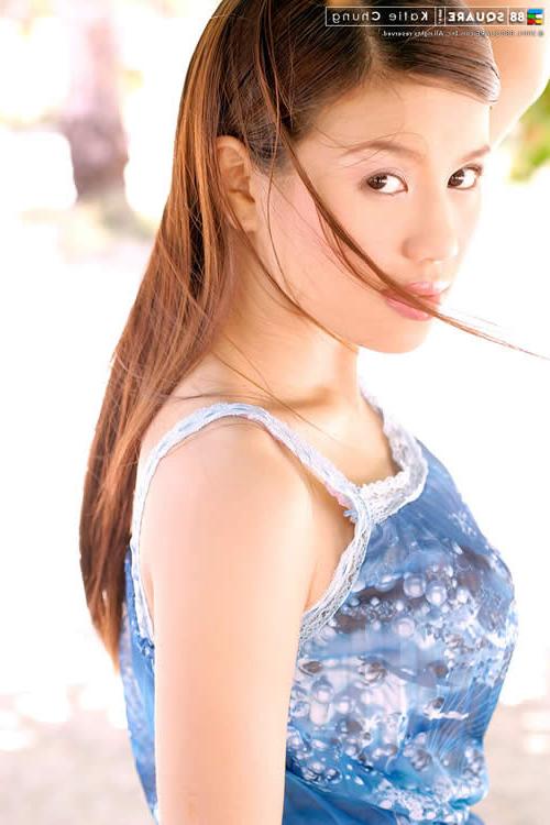 15P Adorable asian teen posing outside