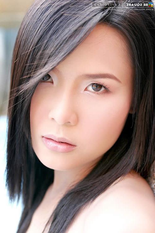 15P Adorable asian girl in a bikini