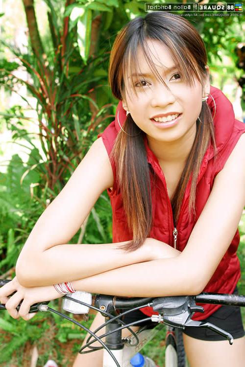 15P Adorable asian girl posing outside