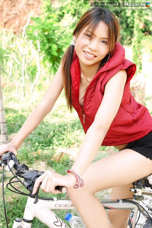 15P Adorable asian girl posing outside