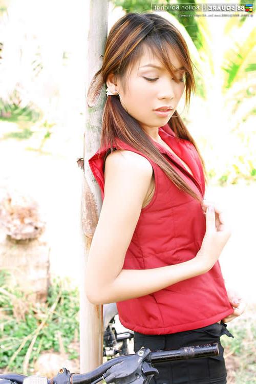 15P Adorable asian girl posing outside