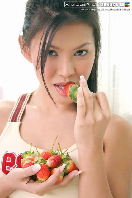 15P Adorable asian teen posing in bed