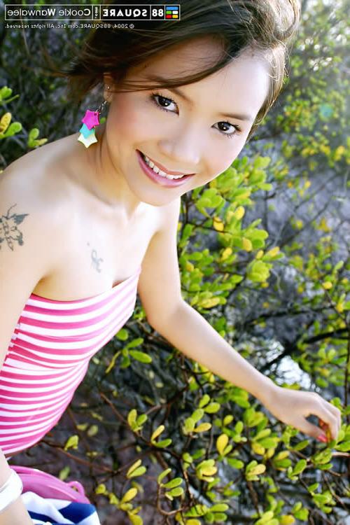 15P Adorable young asian naked at the beach