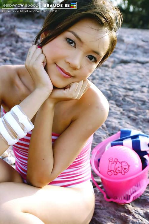 15P Adorable young asian naked at the beach