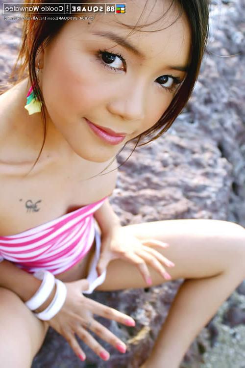 15P Adorable young asian naked at the beach