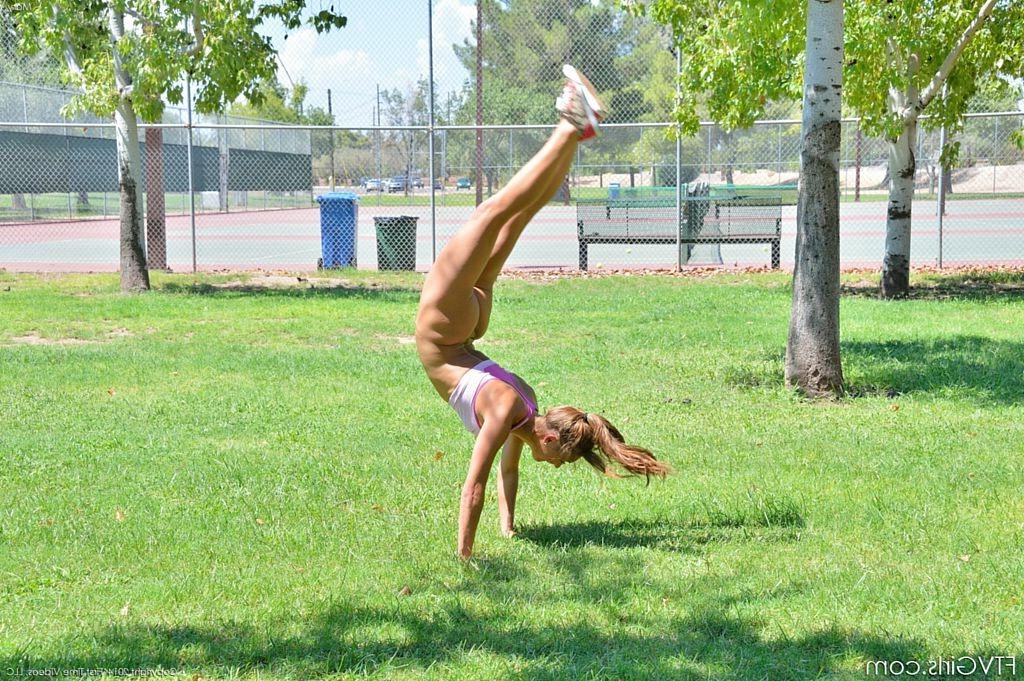 15P Cute gymnast does naked backflips by the tennis court