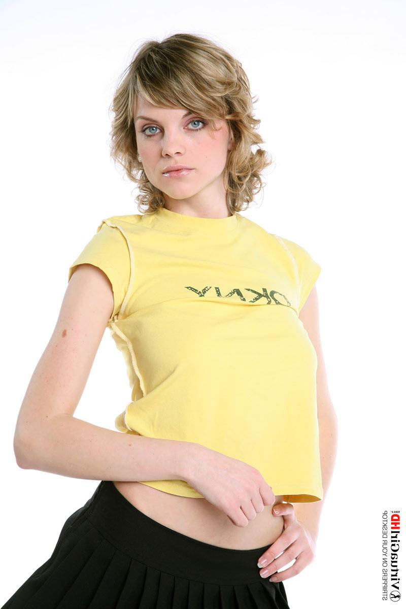16P Adorable blonde Maggie stripping in a short skirt