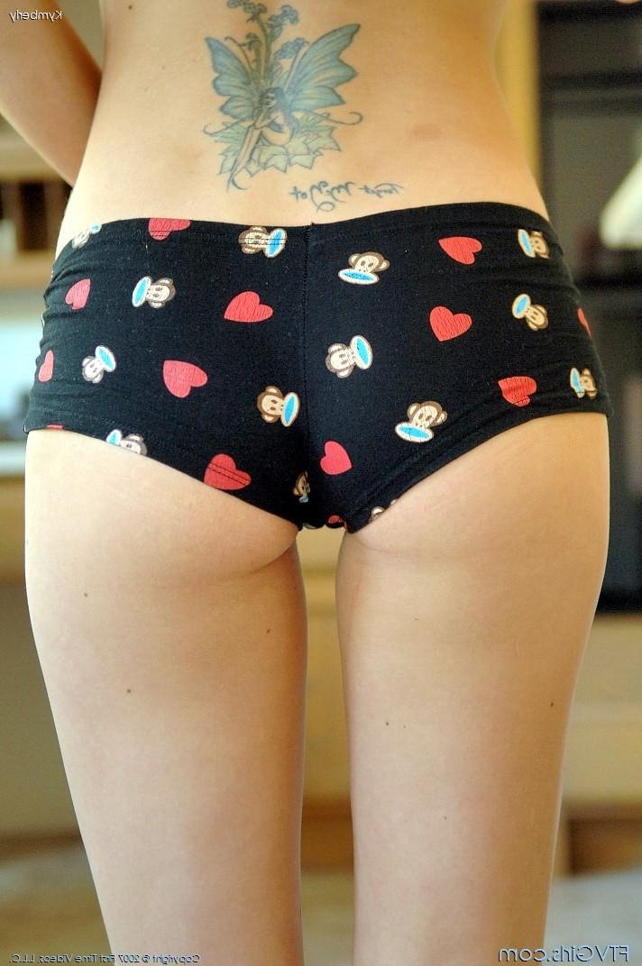 20P Adorable blonde teen babe posing and toying and undressing actio