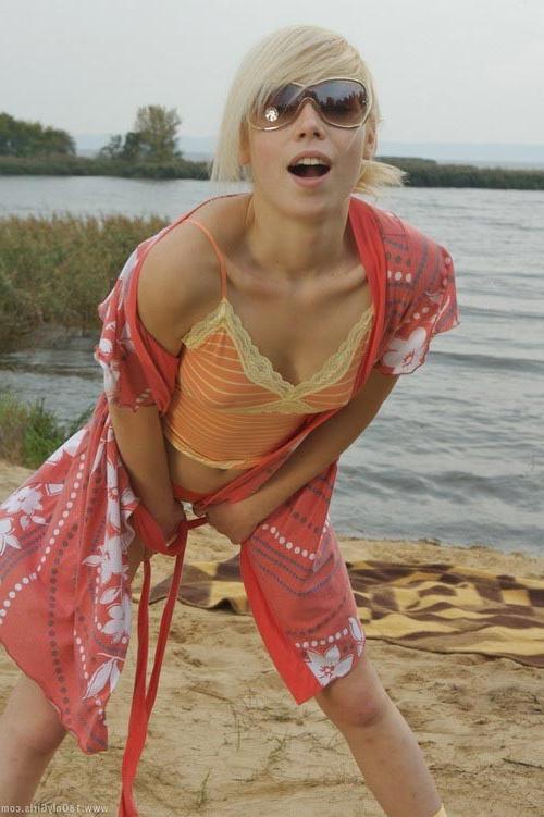 16P Adorable small titted blonde teenie posing naked on the beach