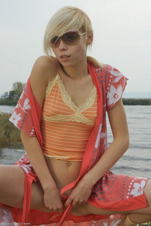 16P Adorable small titted blonde teenie posing naked on the beach