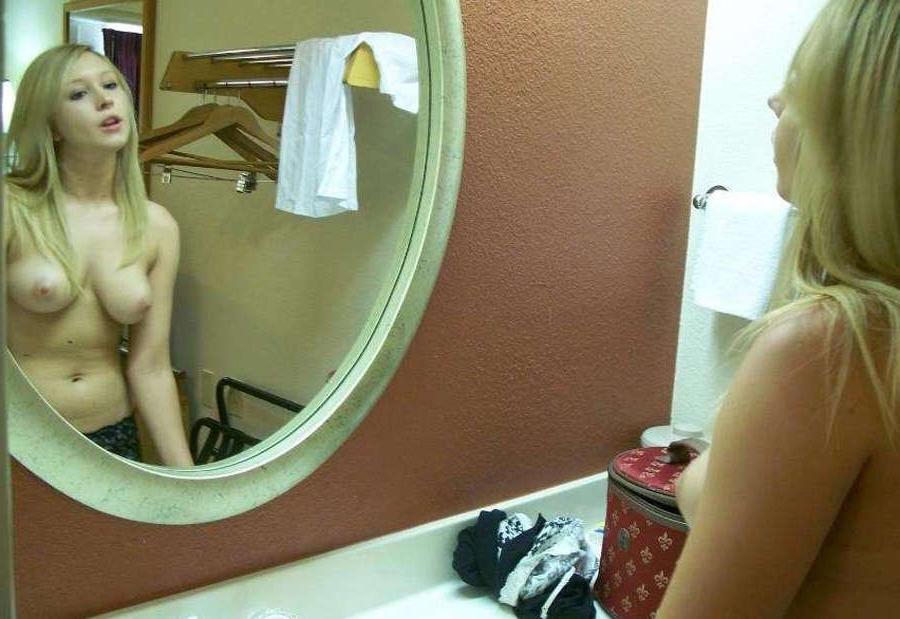 15P Pictures of a lovely teen showing off her perky tits