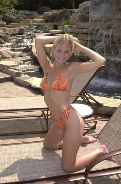 15P Adorable blonde sunbathing