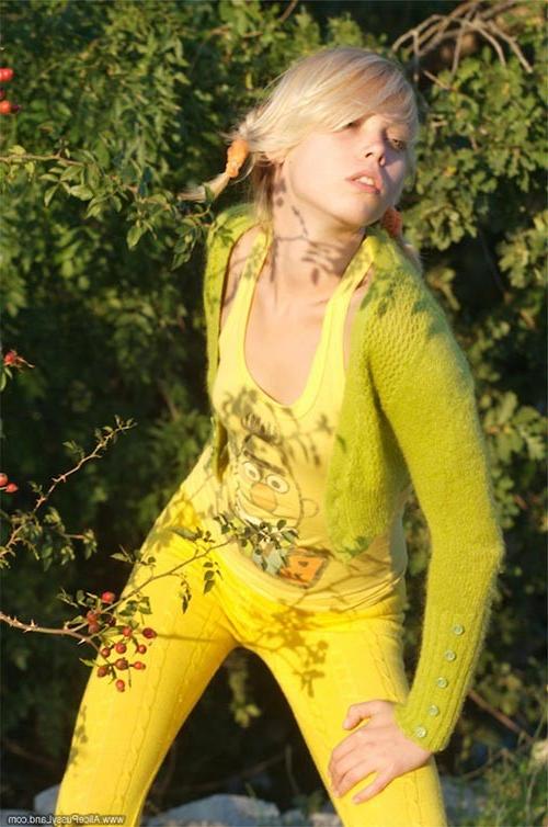 17P Young adorable small titted blonde babe posing naked outdoors