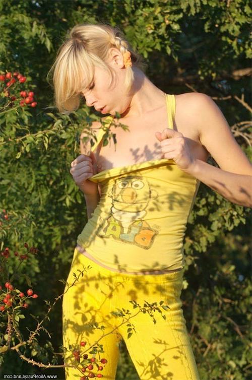 17P Young adorable small titted blonde babe posing naked outdoors