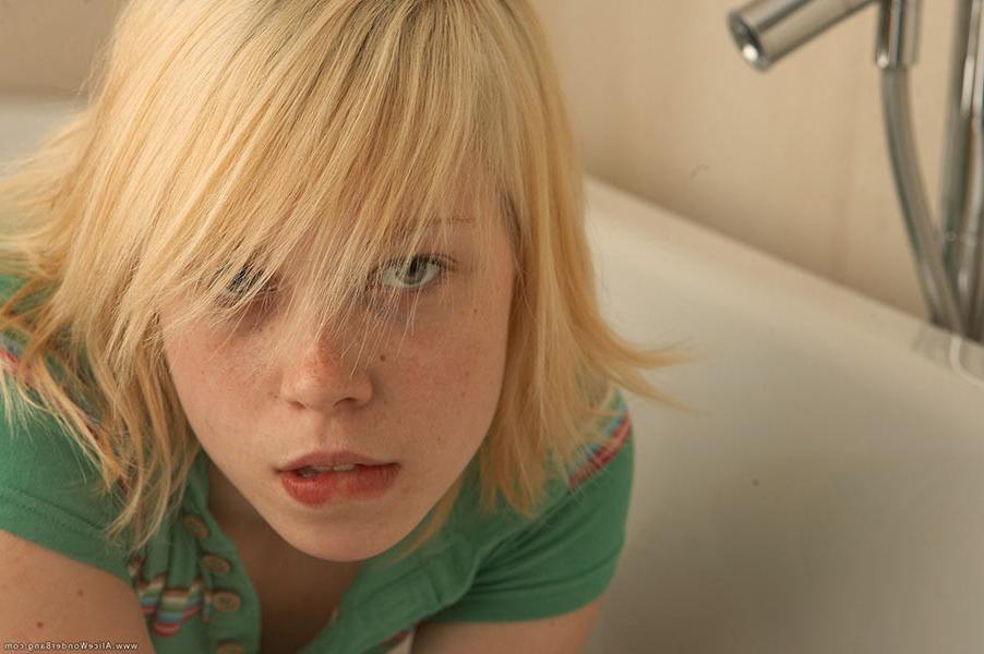 17P Adorable small titted blonde teenie stripping in the bathroom