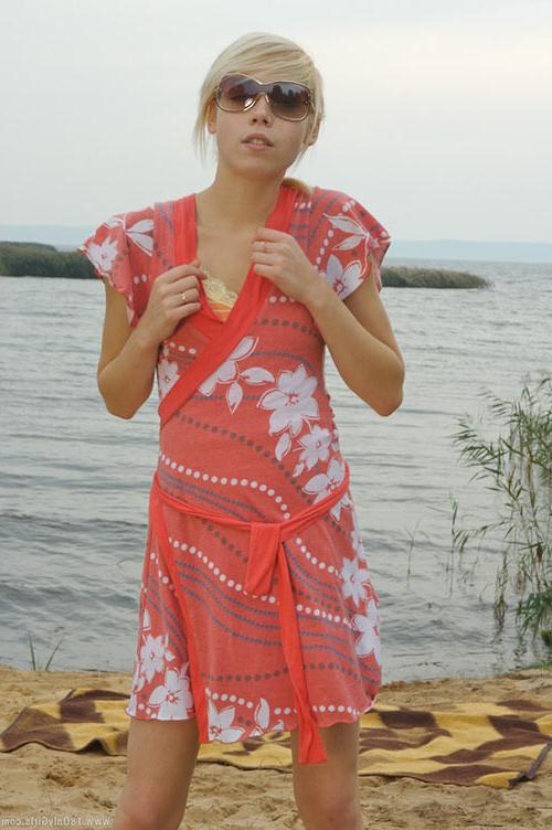 16P Adorable small titted blonde teenie posing naked on the beach