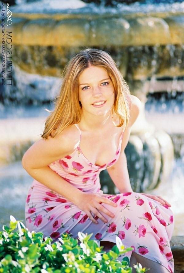 20P Adorable redhead teen with huge breasts in black dress posing