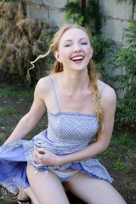 16P Adorable blonde cutie pie shows her tits outdoors