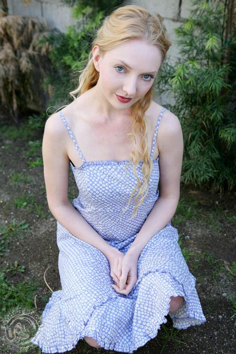 16P Adorable blonde cutie pie shows her tits outdoors