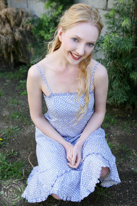 16P Adorable blonde cutie pie shows her tits outdoors
