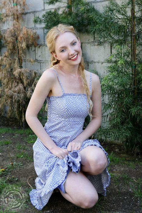 16P Adorable blonde cutie pie shows her tits outdoors