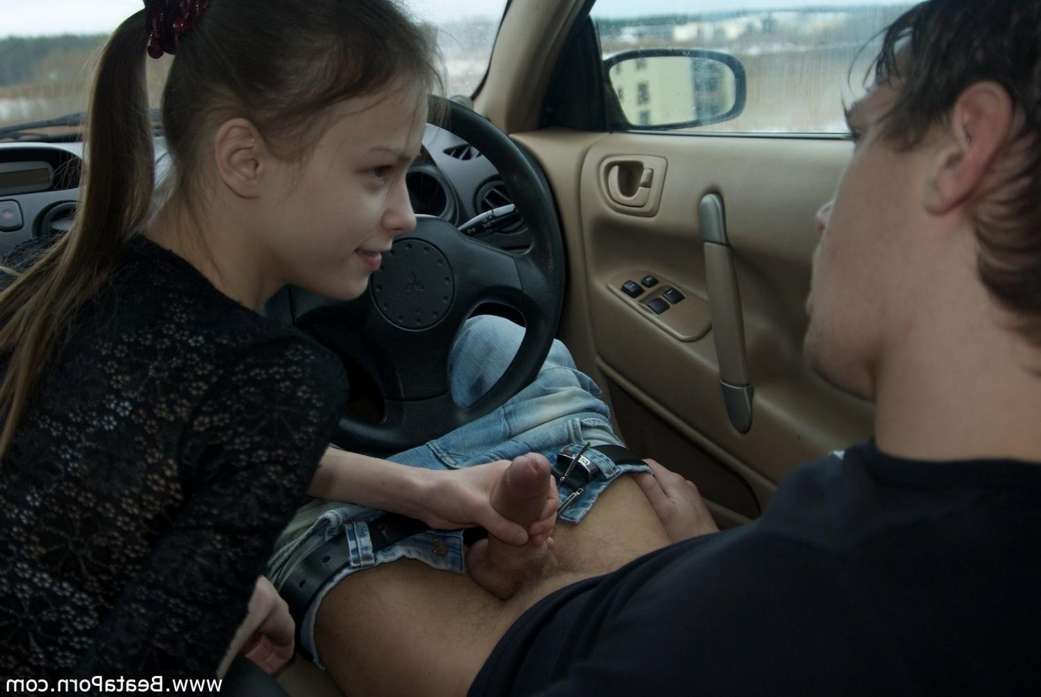 15P Adorable teenie giving a skilful blowjob in the car
