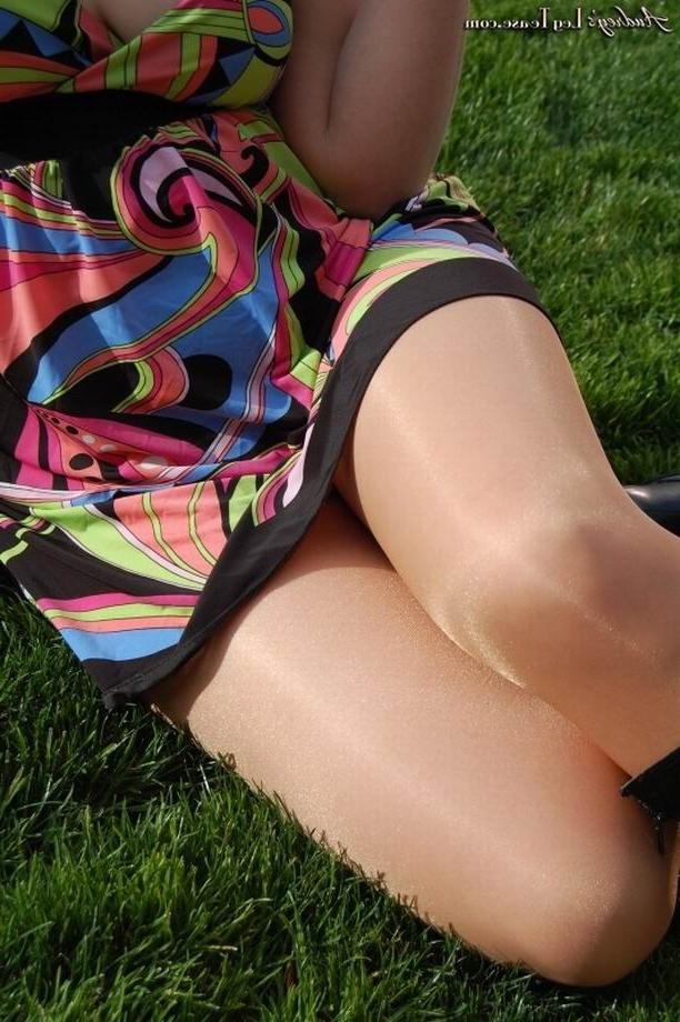 16P Amateur Audrey in pantyhose smoking and flashing in publilc