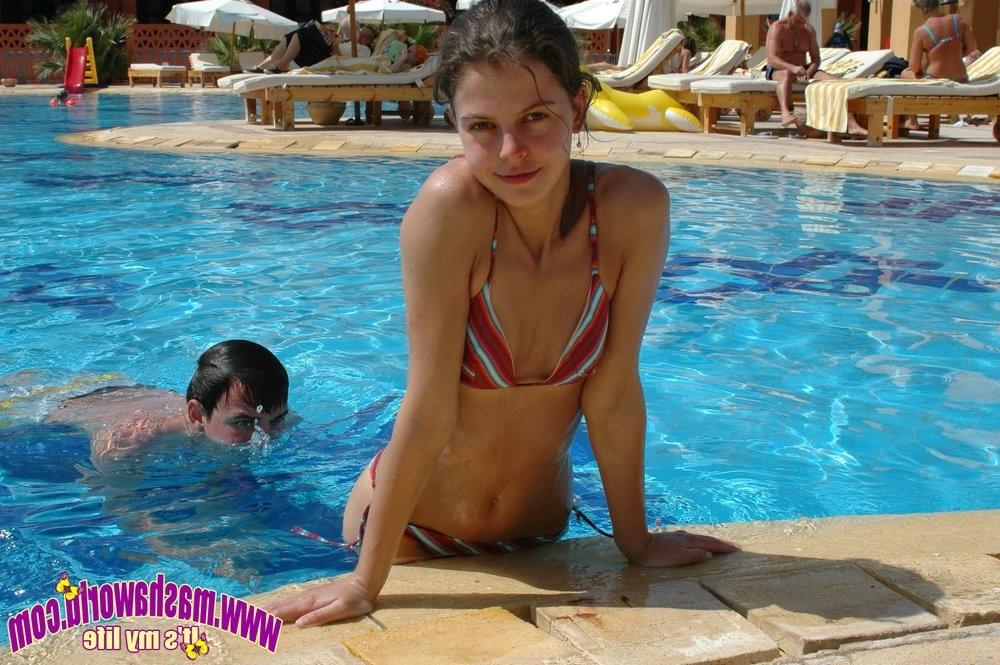 15P Two adorable girlfriends flashing nude