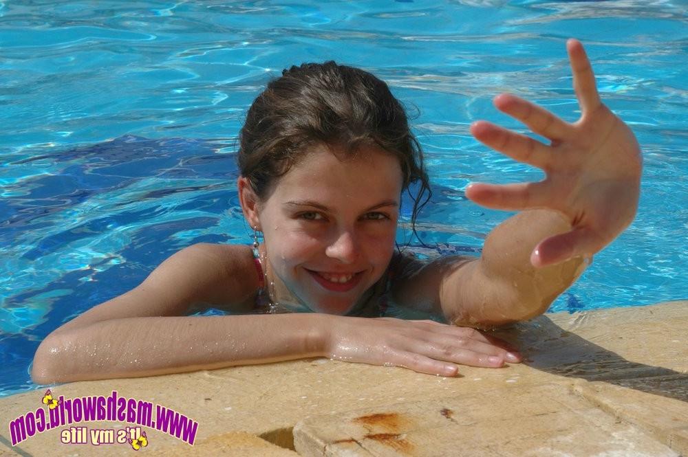 15P Two adorable girlfriends flashing nude