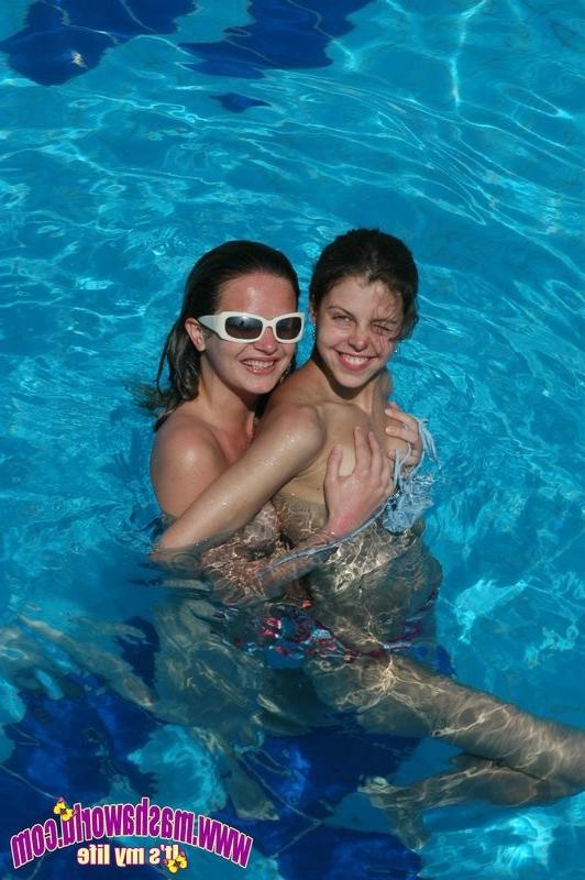 15P Two adorable girlfriends flashing nude