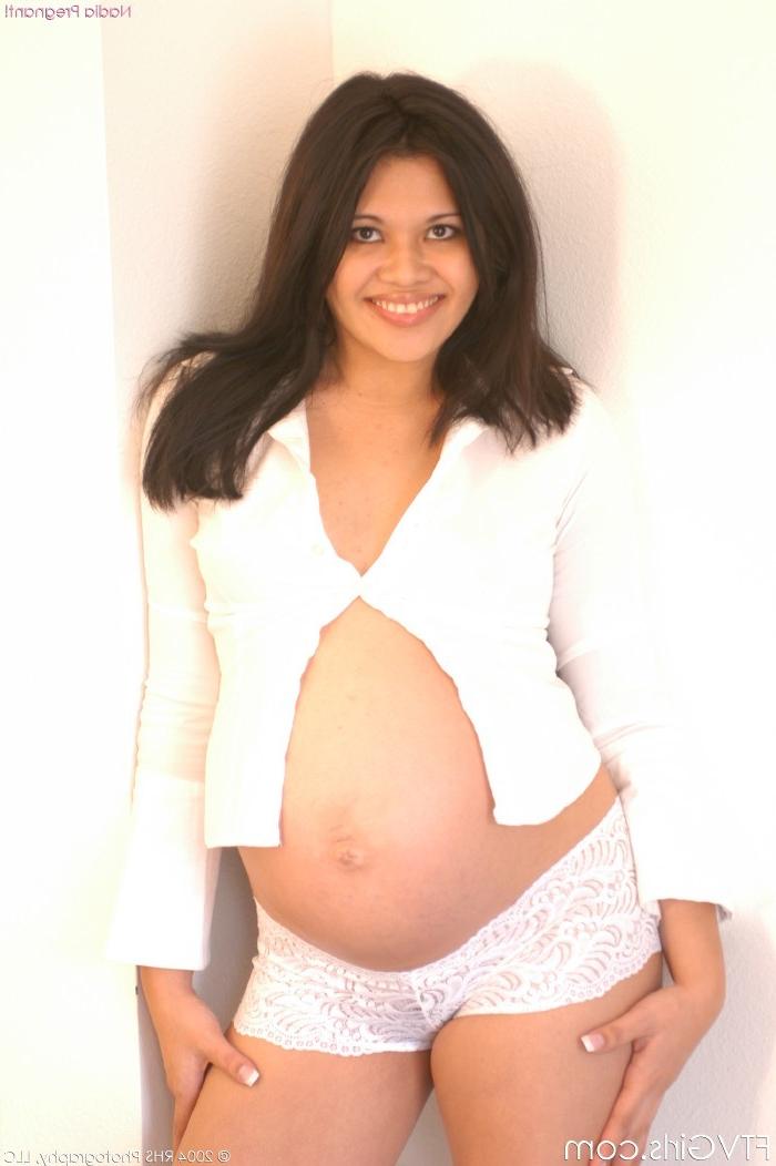 20P Adorable pregnant teen posing her pussy and lactating on the toy
