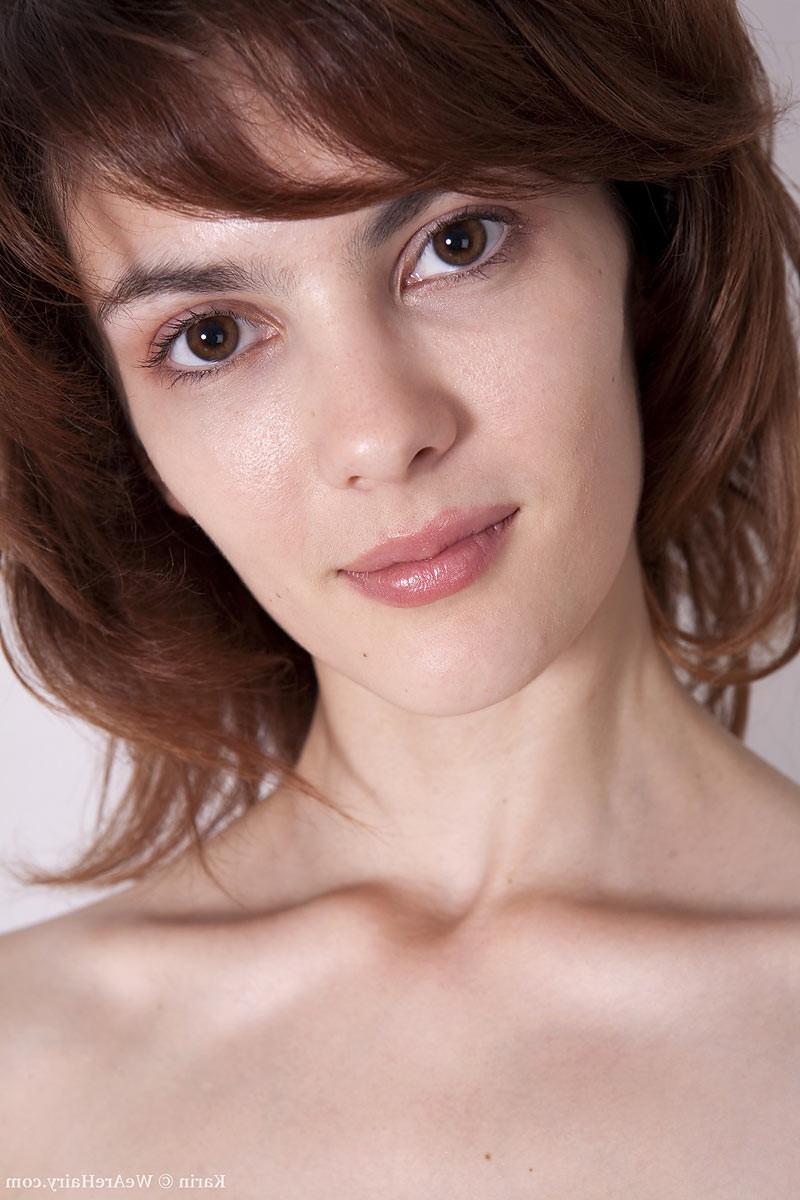 16P Adorable petite brunette slides a toy into her hairy snatch