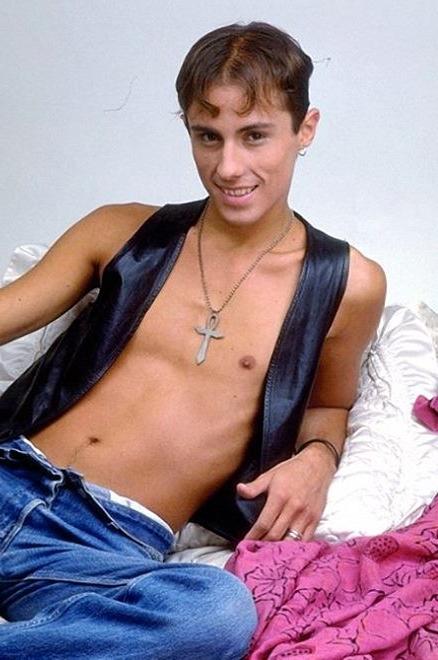20P A cute leather twink enjoys stripping and showing off for camera