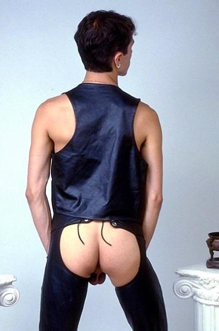 20P A cute leather twink enjoys stripping and showing off for camera