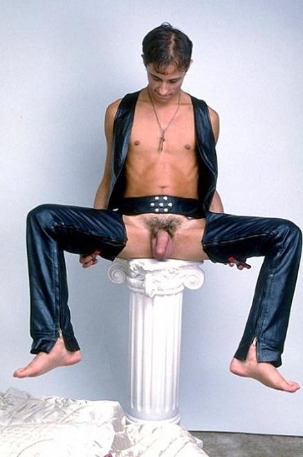 20P A cute leather twink enjoys stripping and showing off for camera