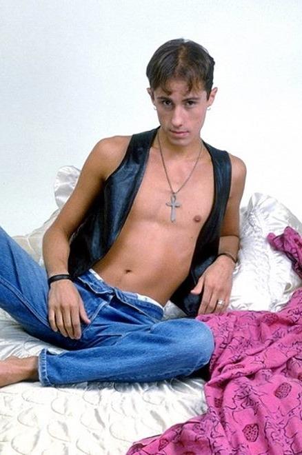 20P A cute leather twink enjoys stripping and showing off for camera