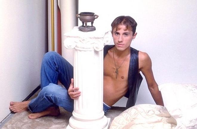 20P A cute leather twink enjoys stripping and showing off for camera