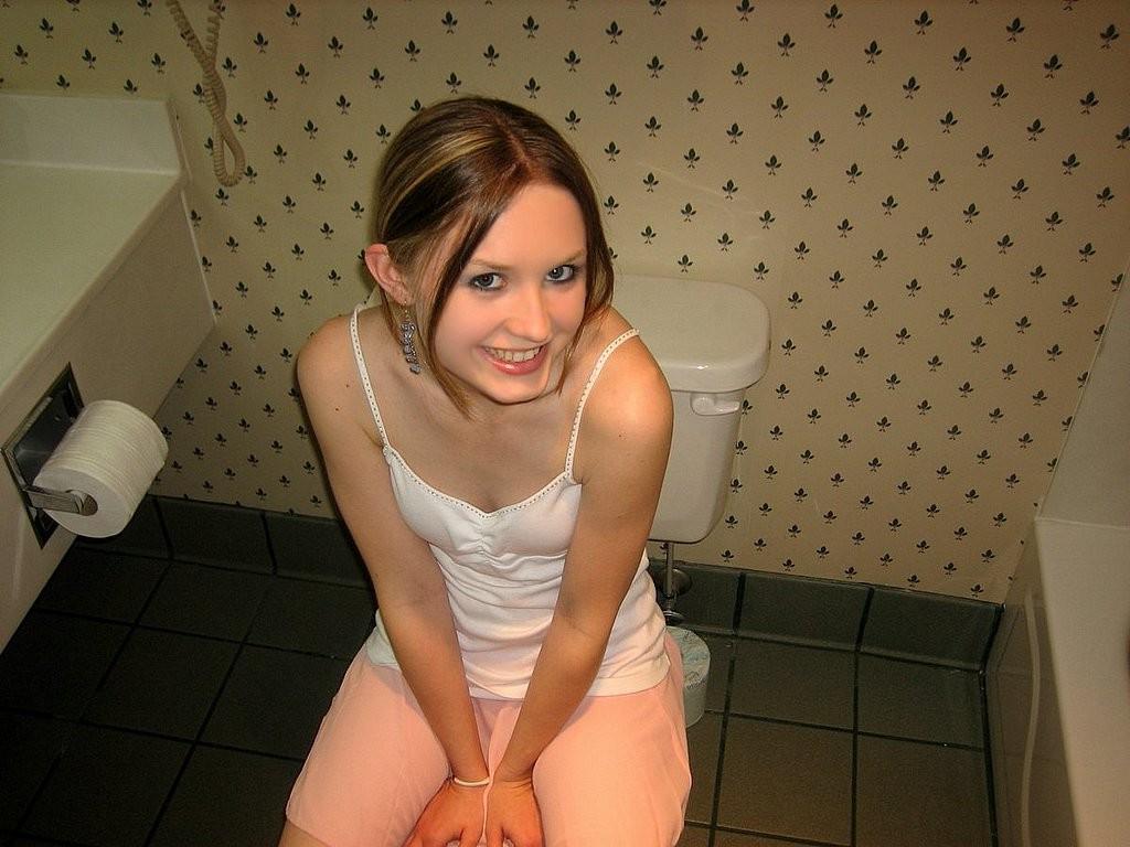 15P Petite teenie with tiny boobies rubs her sweet pussy