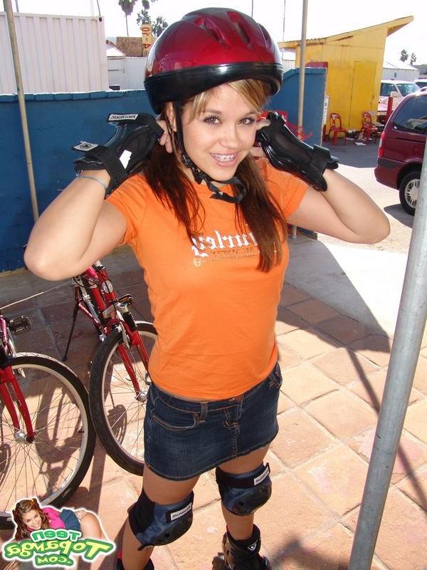 15P Adorable eighteen year old rollerblading and flashing outdoors
