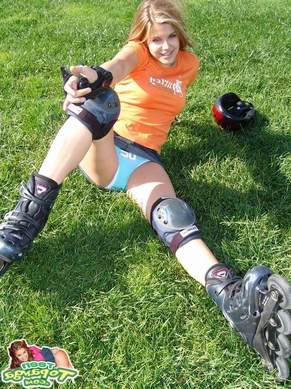 15P Adorable eighteen year old rollerblading and flashing outdoors