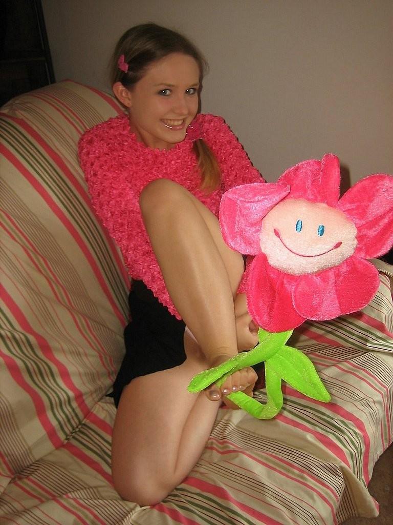 15P Playful blonde teen with tiny tits removes panties
