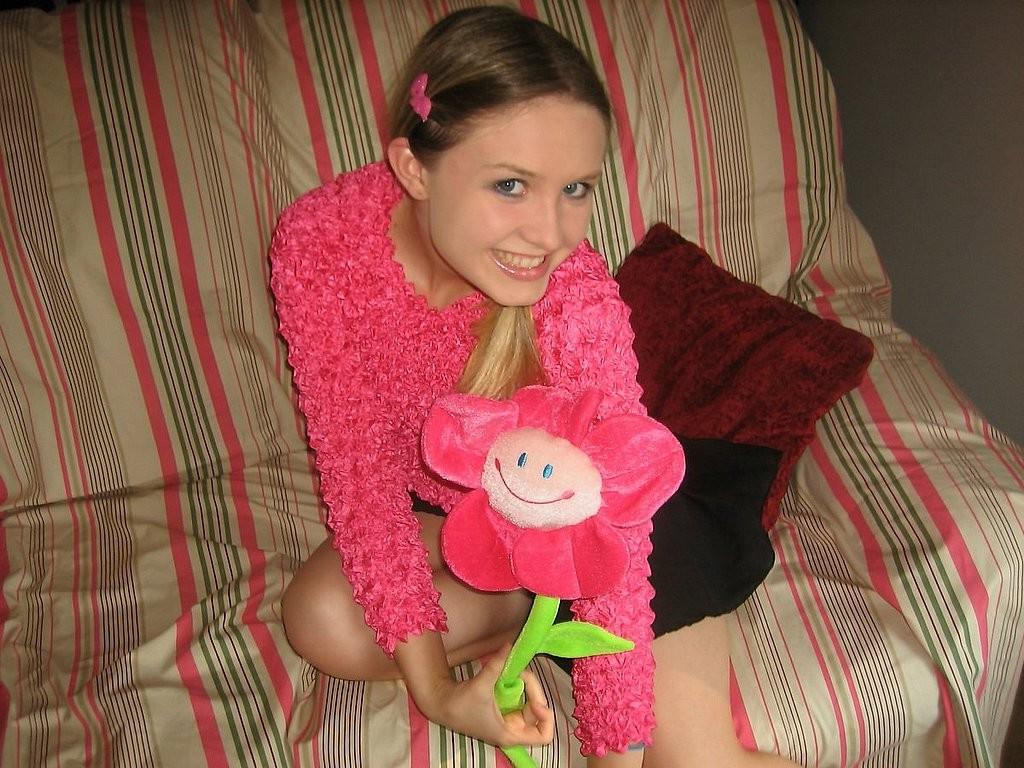 15P Playful blonde teen with tiny tits removes panties