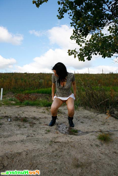 16P Adorable young brunette hoochie caught pissing alfresco