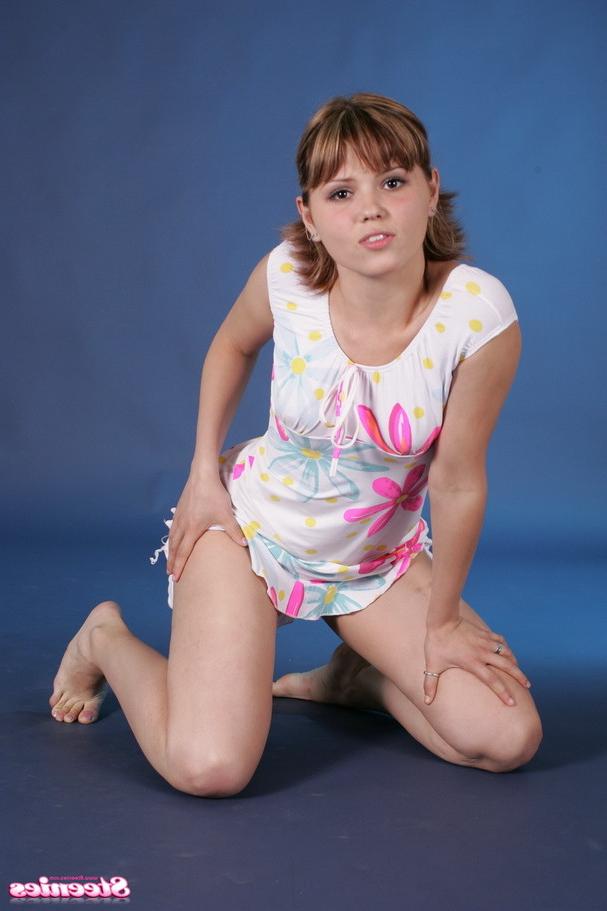 12P Adorable 18 year old girl undresses and poses naked