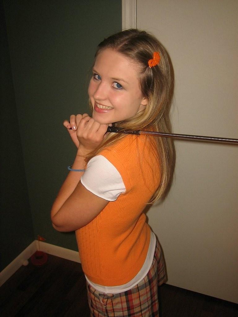 15P Shy blonde teen teasing the camera with her tiny tits