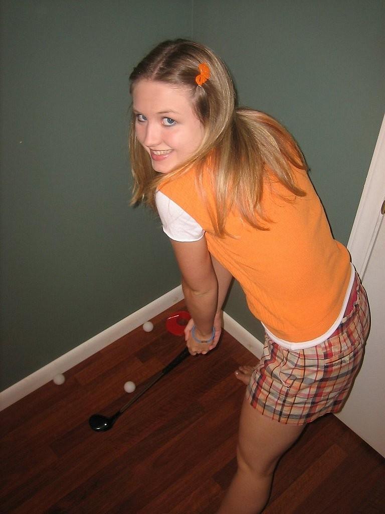 15P Shy blonde teen teasing the camera with her tiny tits
