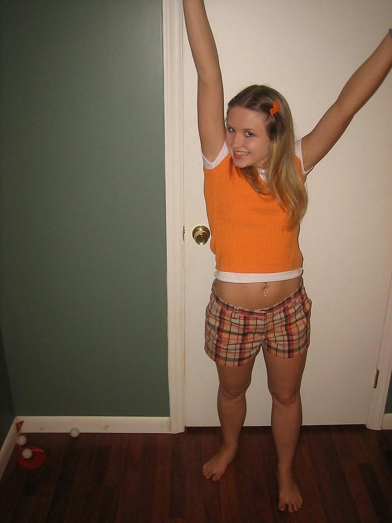 15P Shy blonde teen teasing the camera with her tiny tits