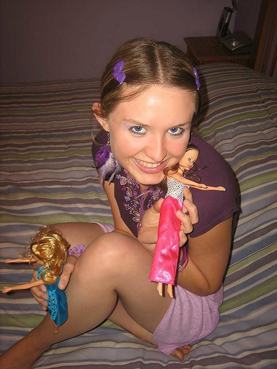 18P Silly teen getting nude and having fun with barbie